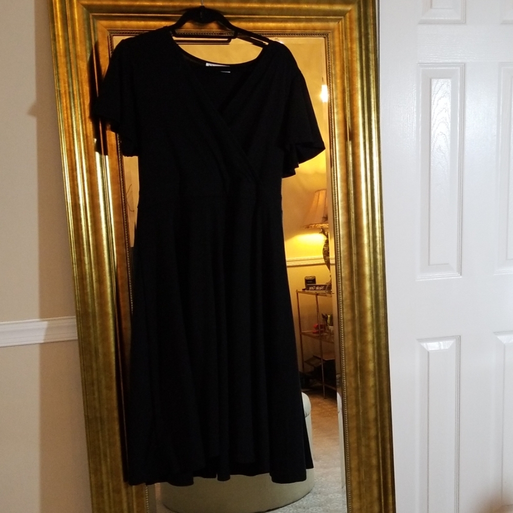 Black dress ties in back wrap style top